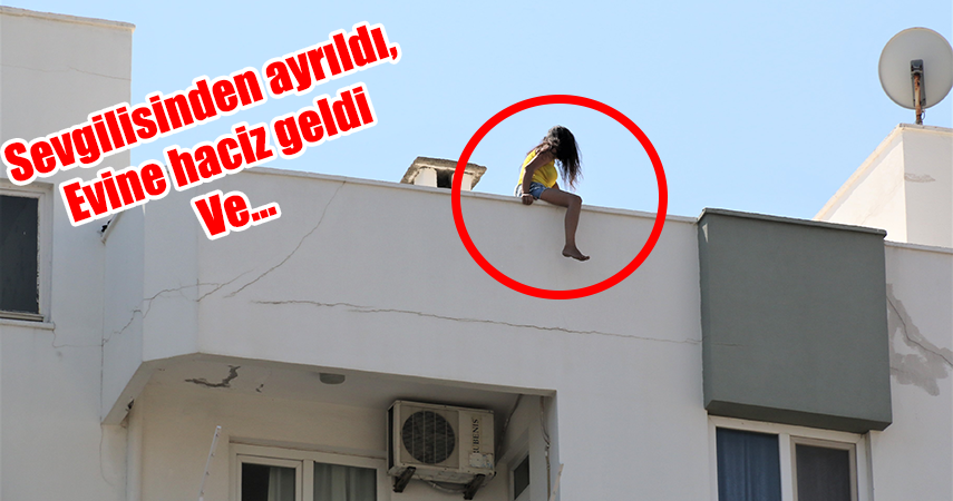 Sevgilisinden ayrılan genç kız çatıya çıktı, vatandaşlar film izler gibi izleyip kayıt aldı